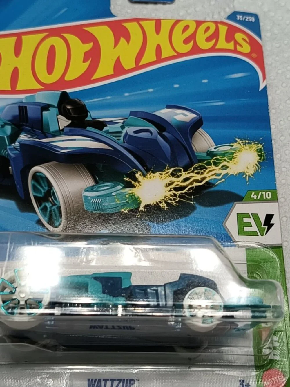 Factory-sealed 2026 Hot Wheels Wattzup with a possible factory wheel error.